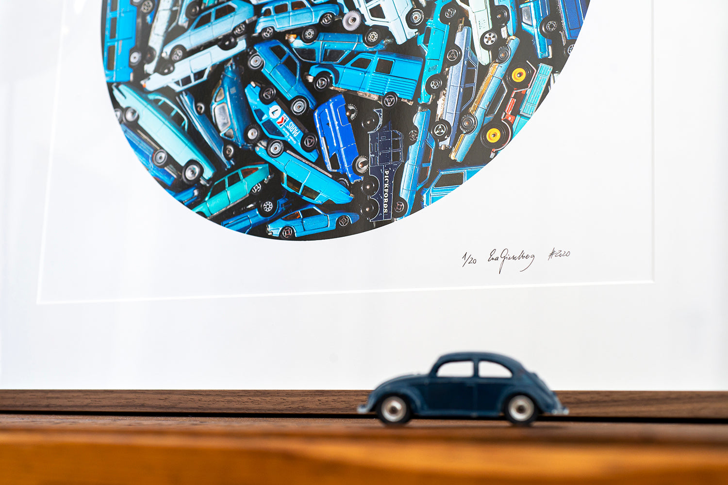 artwork toycars and a blue beetle